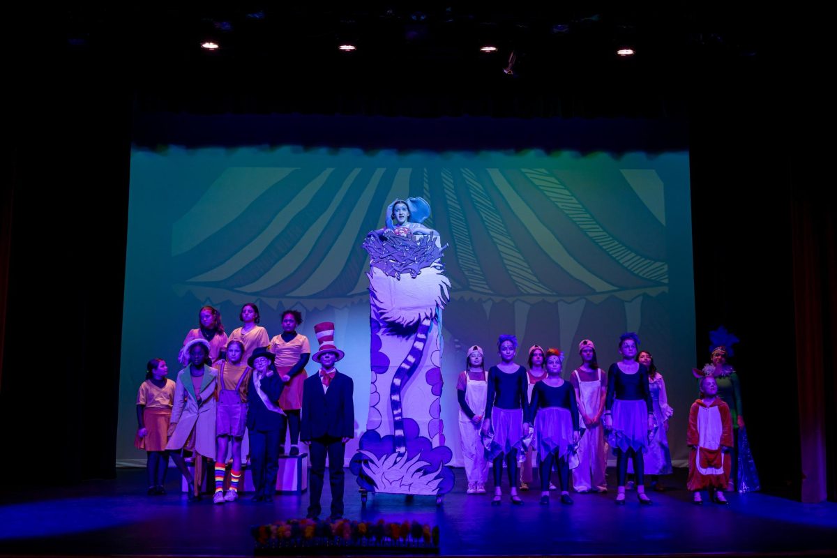 Cast of Seussical performing on stage